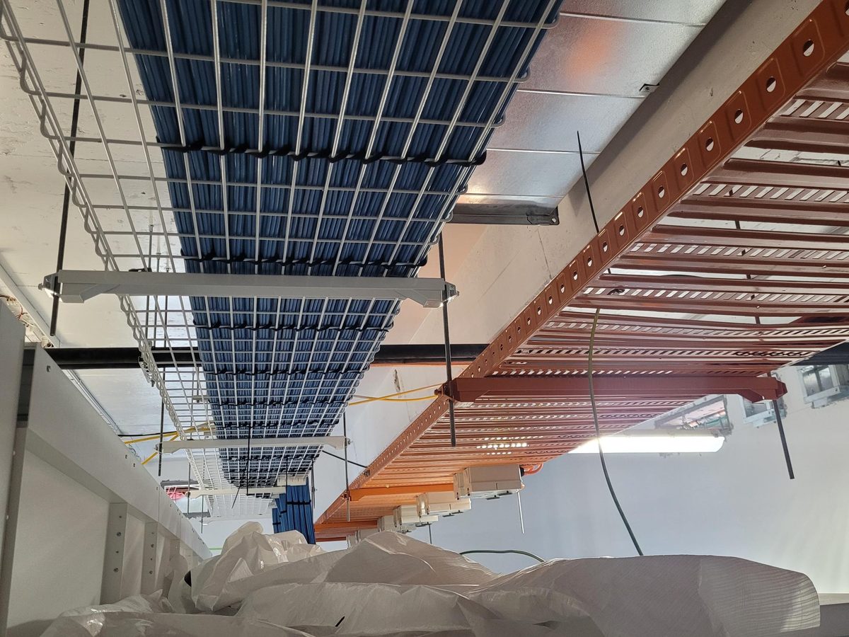 Powdercoated cable ladder and basket mesh on Blitz trapeze supports, Sydney Telecommunications Centre